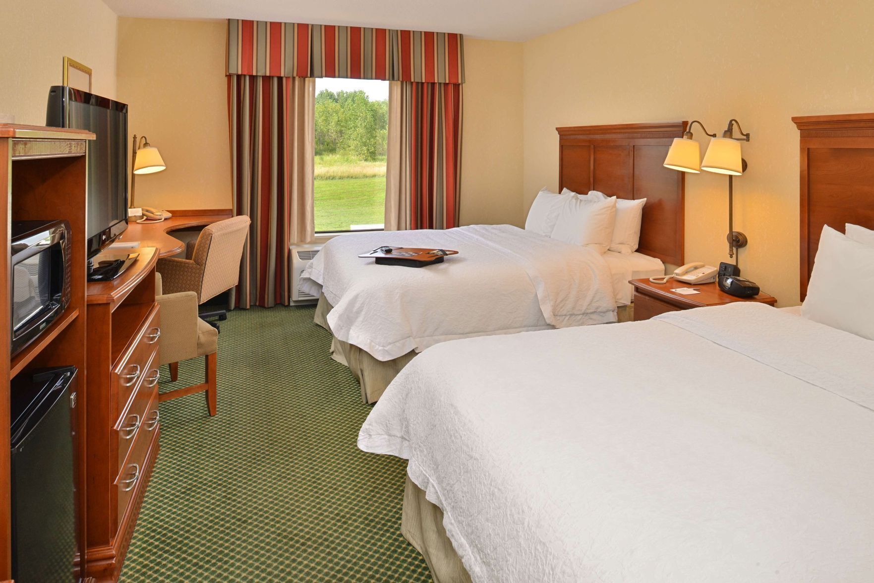 In-room safe, desk, iron/ironing board, free cribs/infant beds