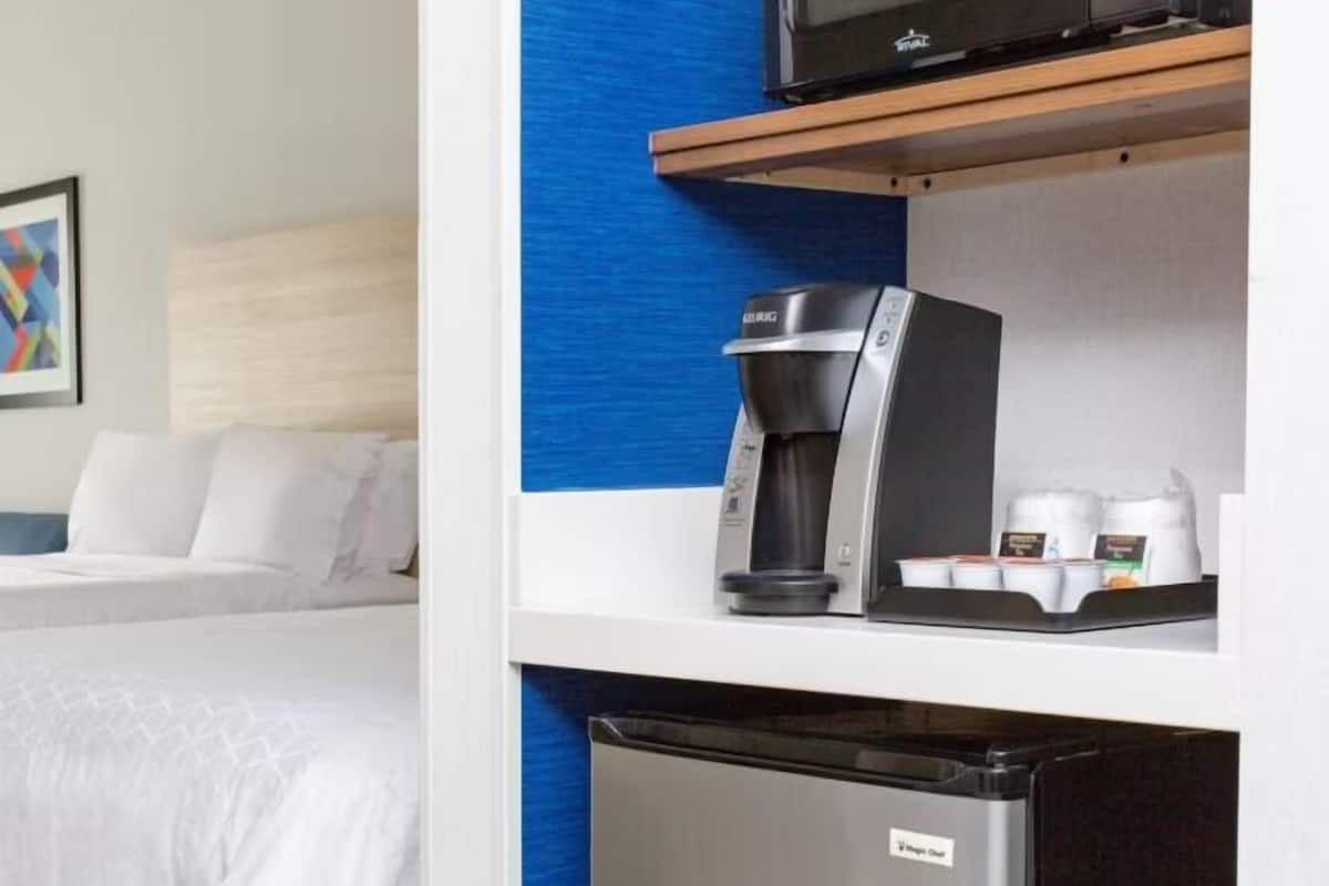 Desk, laptop workspace, blackout curtains, iron/ironing board