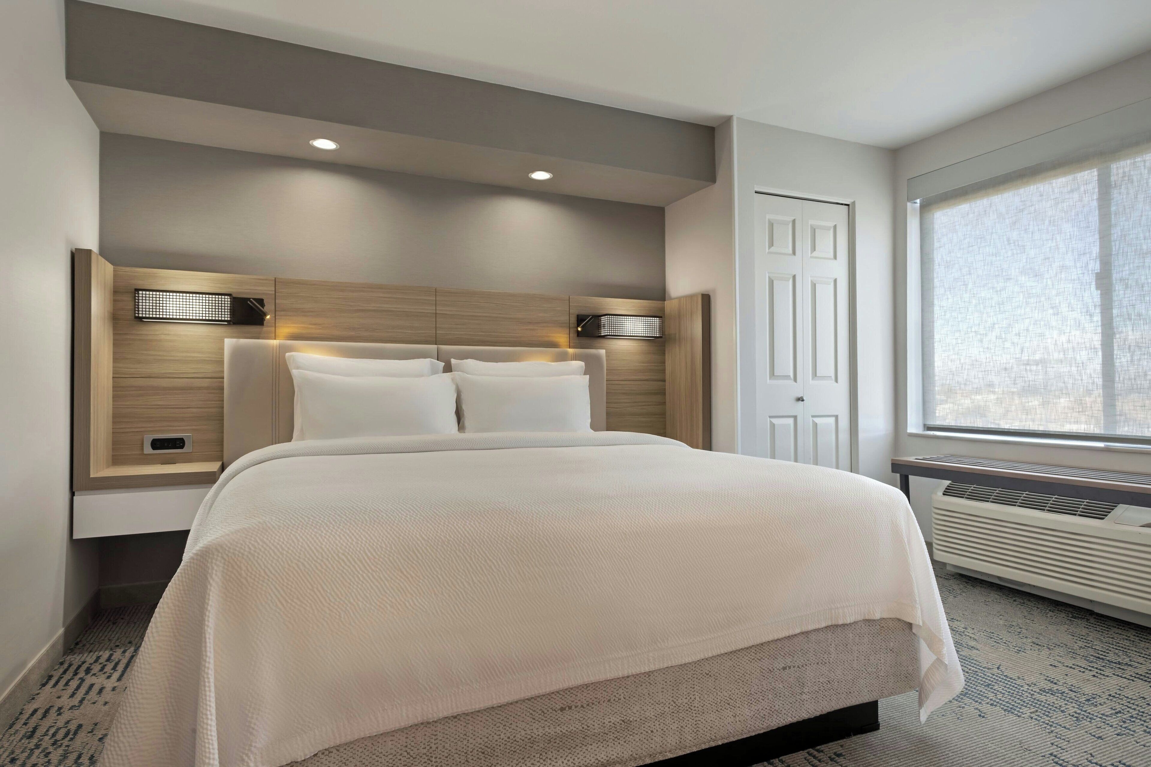 pillow-top beds, desk, blackout curtains, iron/ironing board