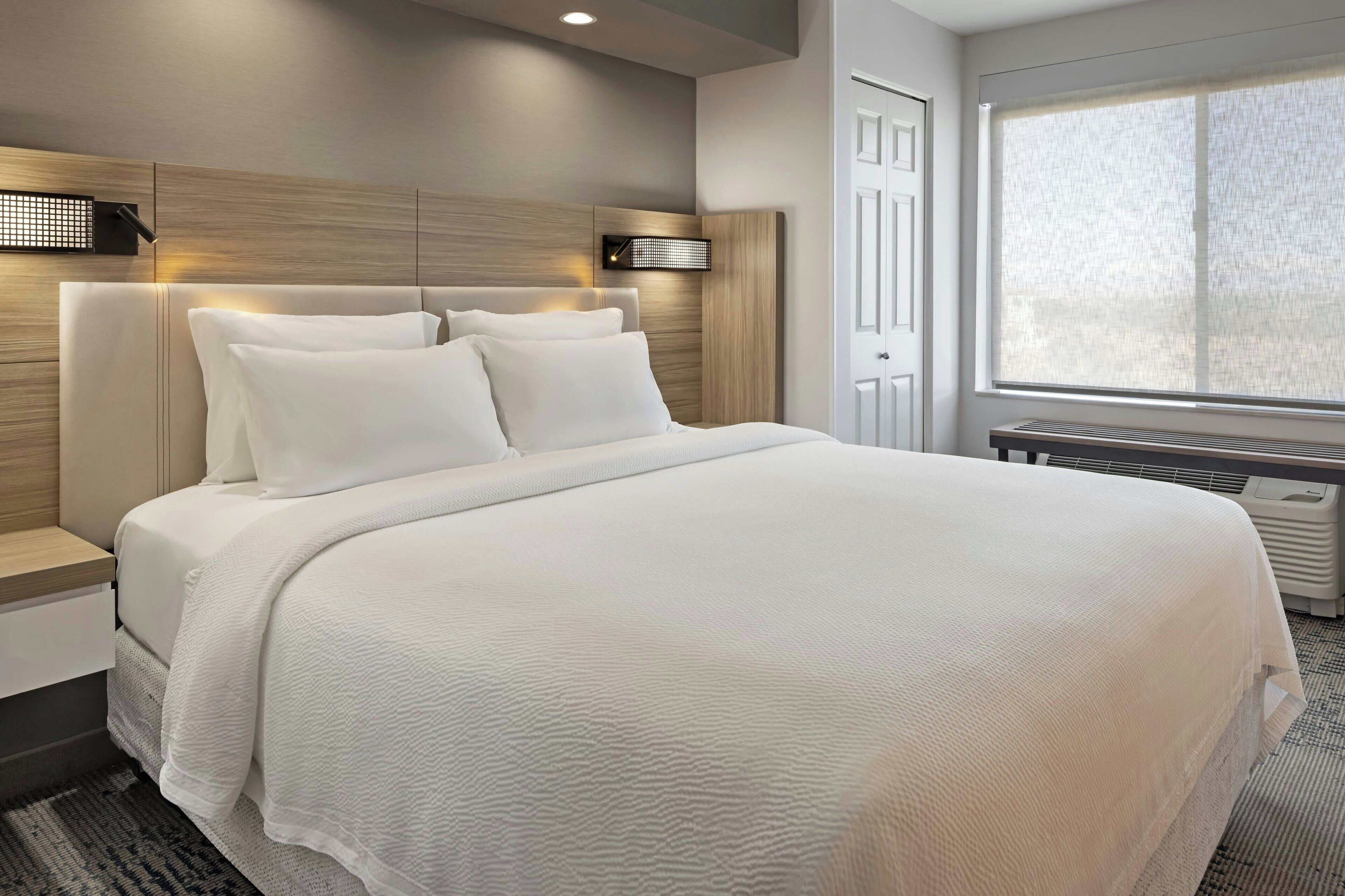 pillow-top beds, desk, blackout curtains, iron/ironing board