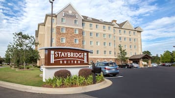 Welcome to Staybridge Suites, where a convenient entrance and ample parking await.