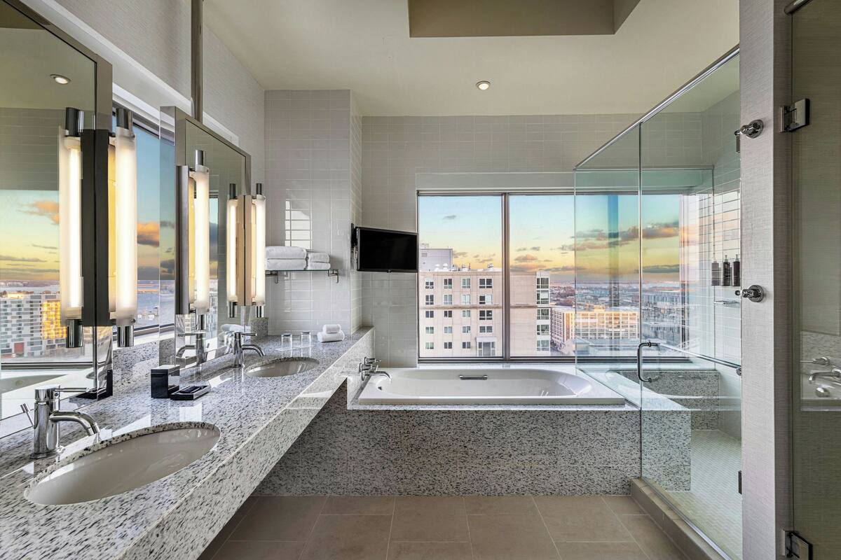 presidential suite, 1 bedroom (view) | bathroom | separate bathtub and shower, free toiletries, hair dryer, bathrobes