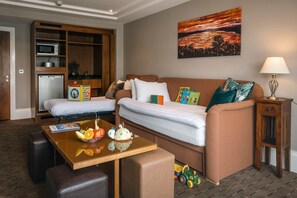 Suite, 1 Bedroom | In-room safe, desk, iron/ironing board, free WiFi