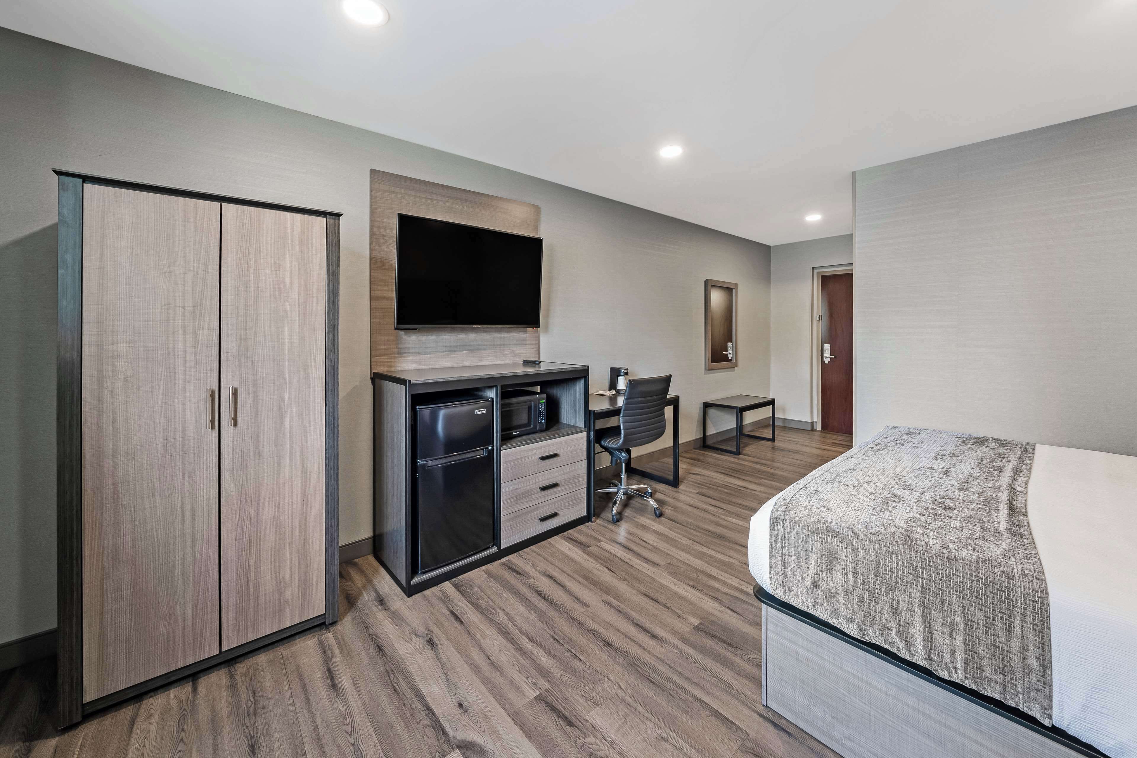 Desk, laptop workspace, blackout curtains, iron/ironing board