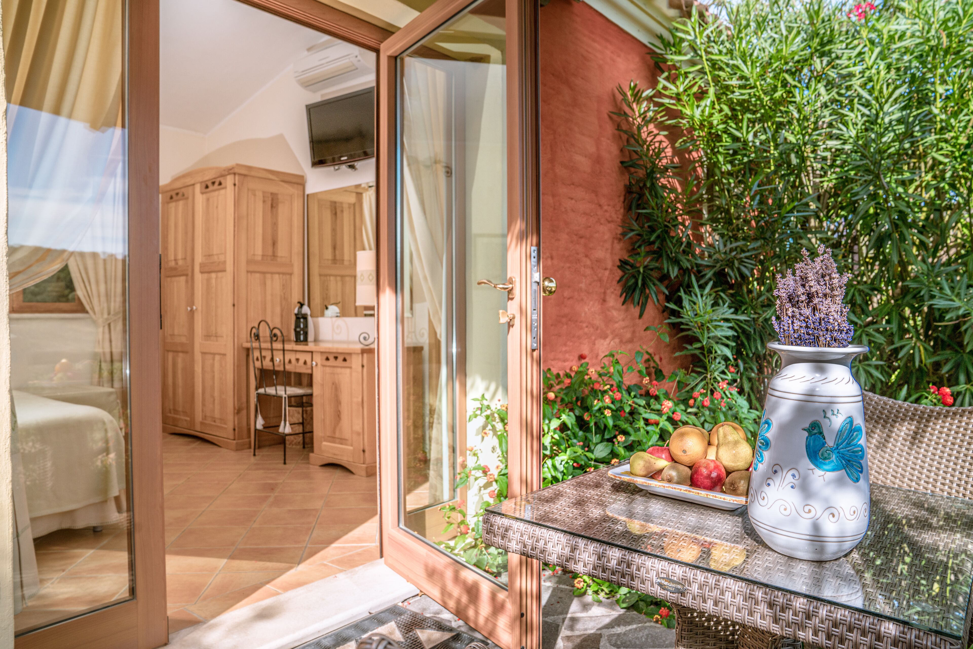 standard triple room, non smoking, garden view | terrace/patio