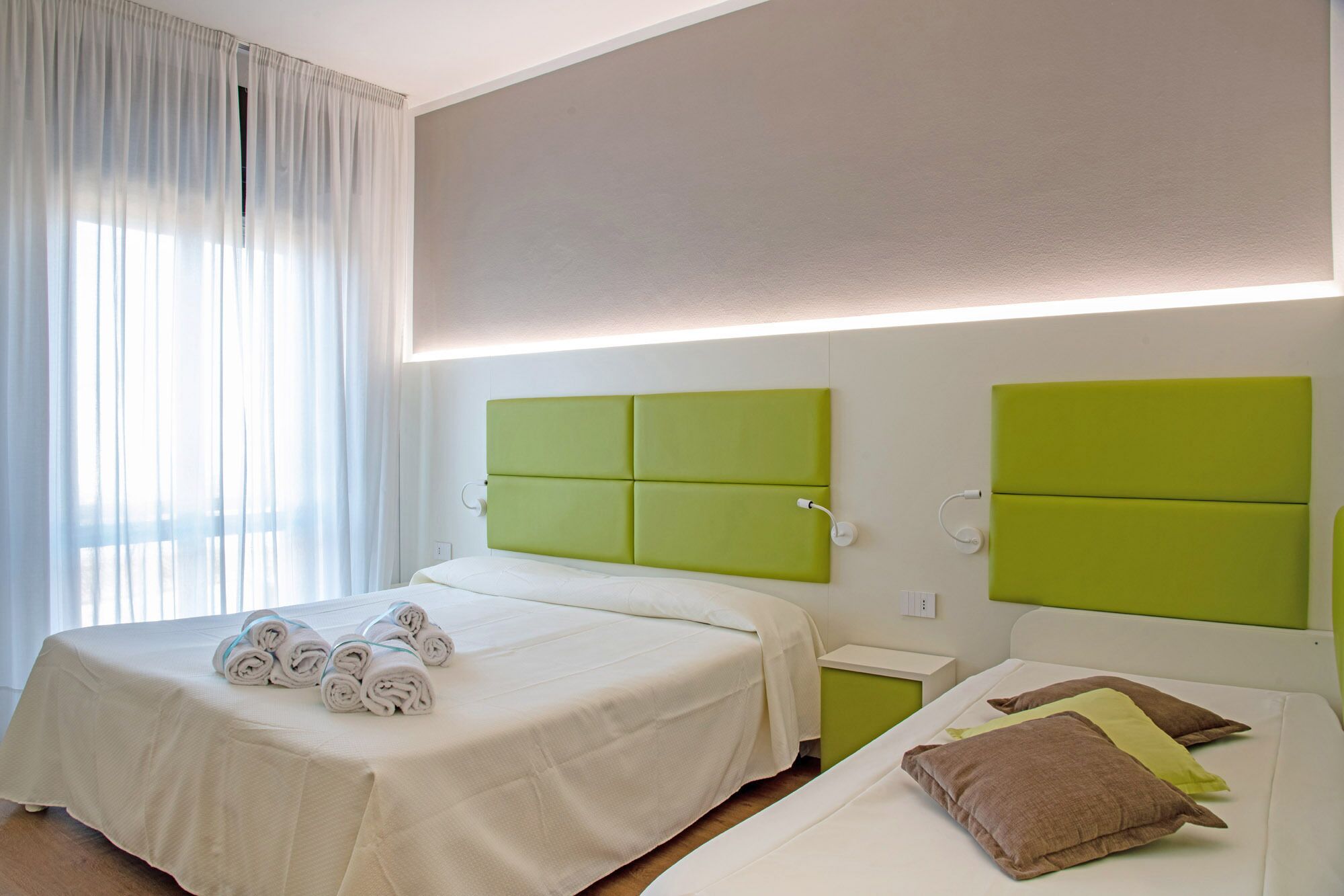 standard triple room, balcony | in-room safe, desk, soundproofing, rollaway beds