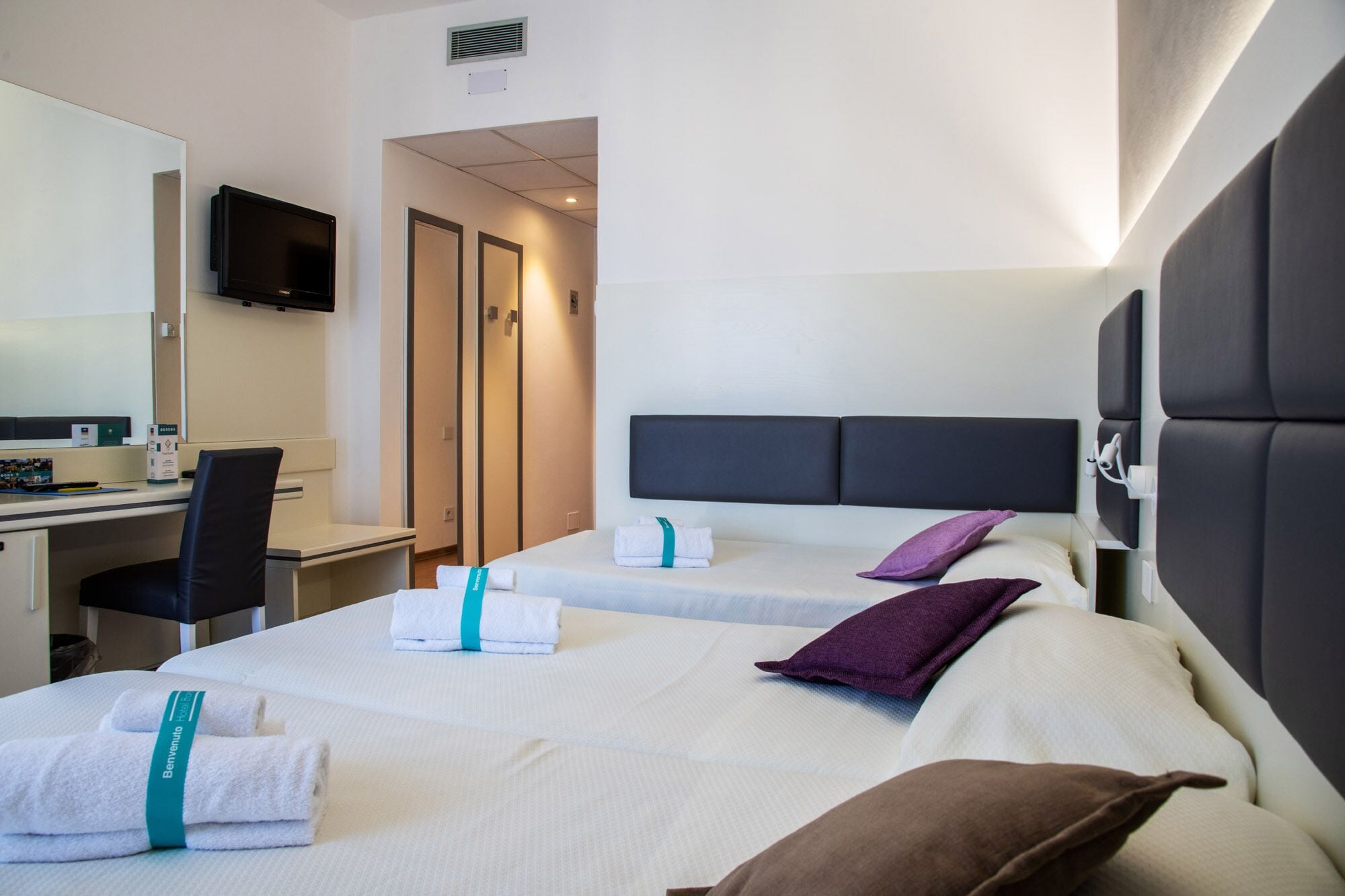 standard triple room, balcony | in-room safe, desk, soundproofing, rollaway beds