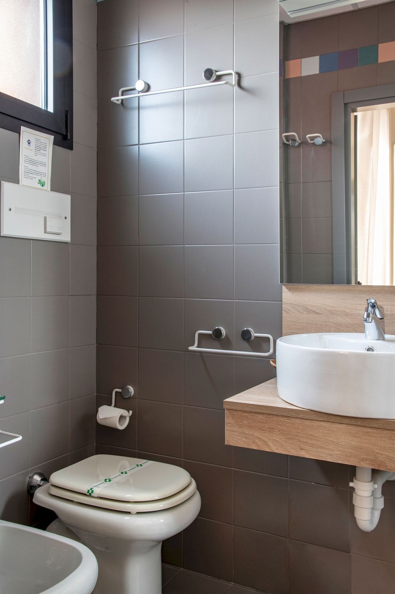 economy single room | bathroom | shower, hair dryer, bidet, towels