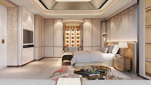A modern bedroom with a bed, bedside tables, a TV, and a decorative wall.