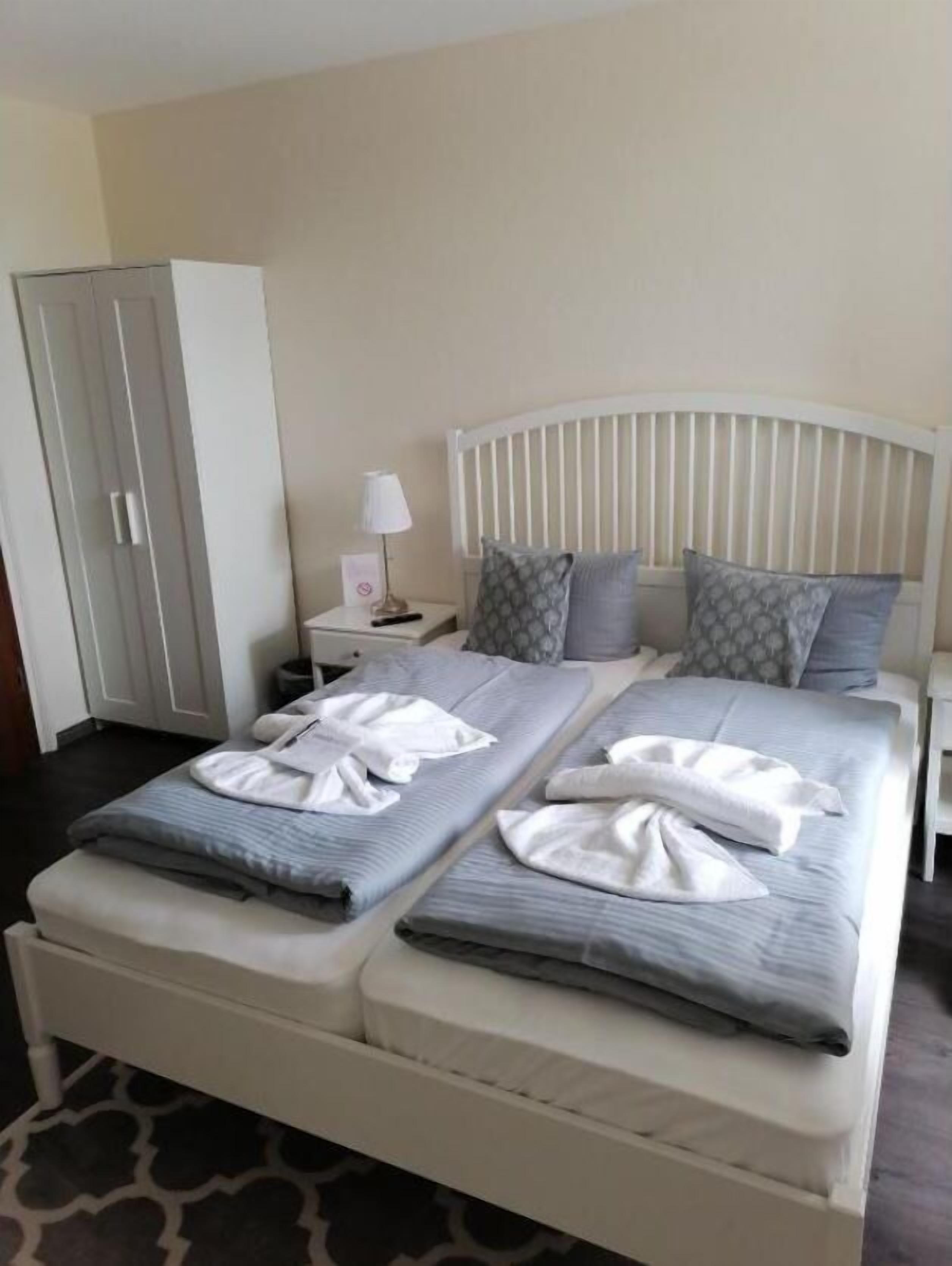 Premium bedding, down comforters, pillowtop beds, desk