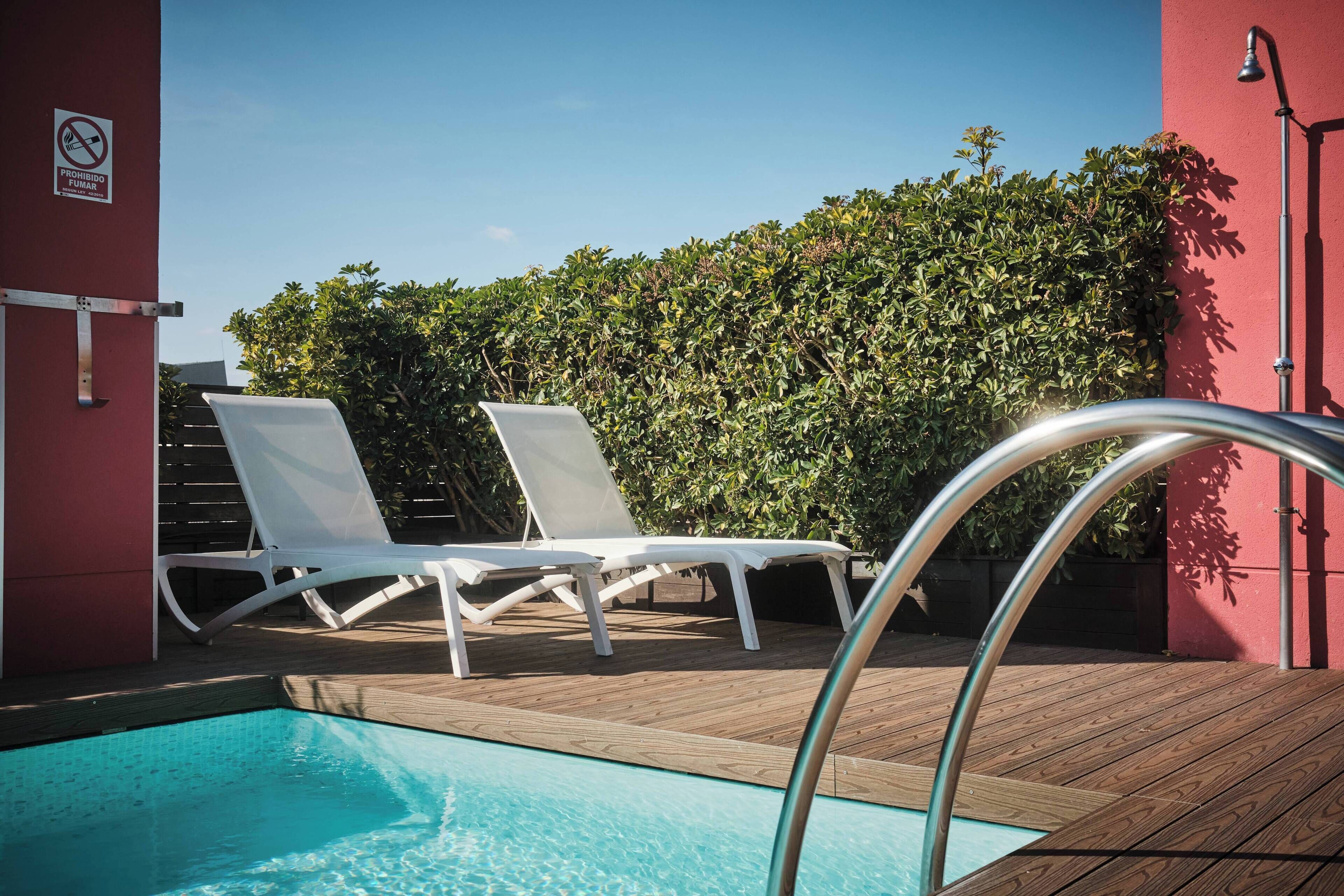 outdoor pool, pool loungers