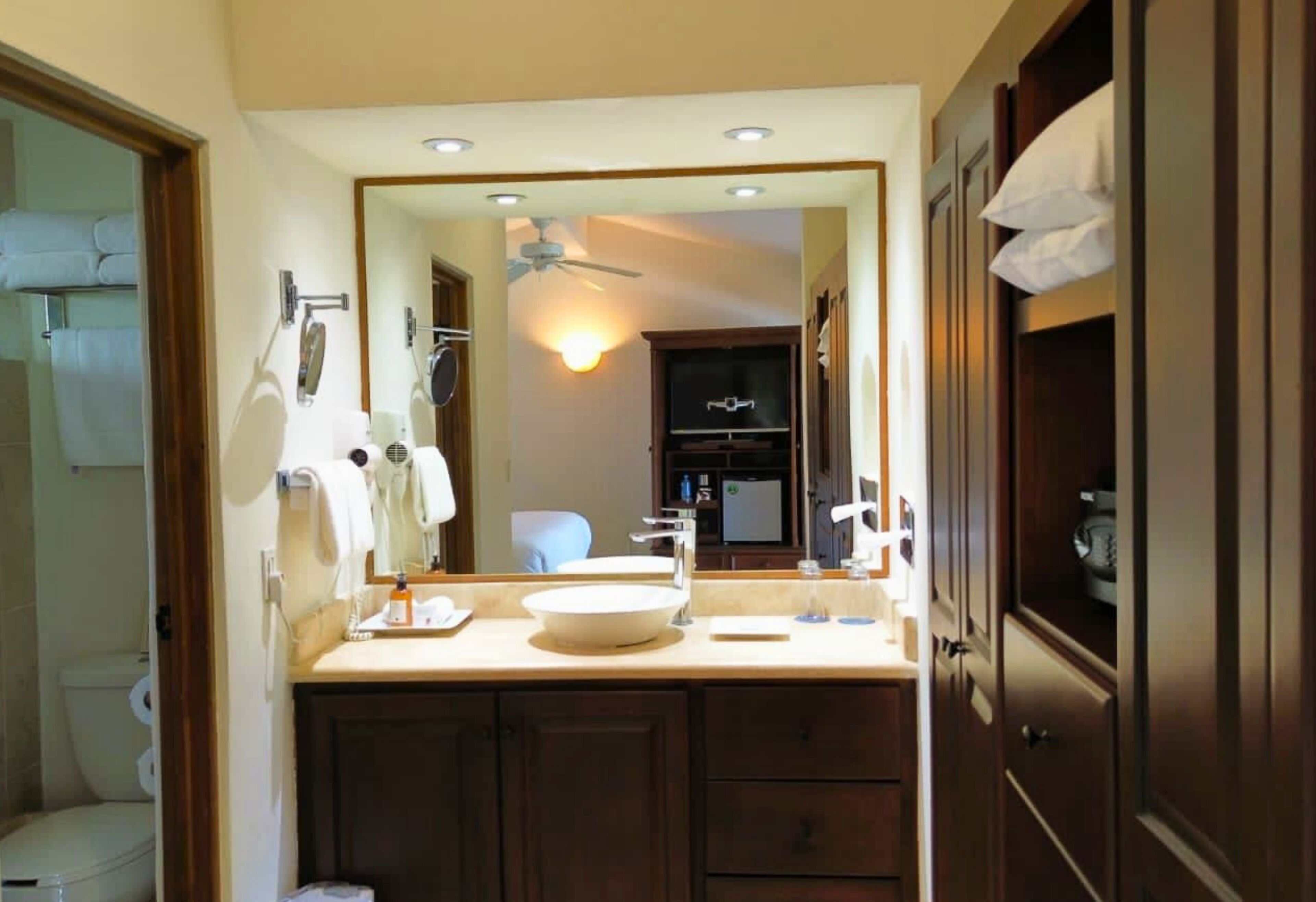 shower, hair dryer, bathrobes, slippers