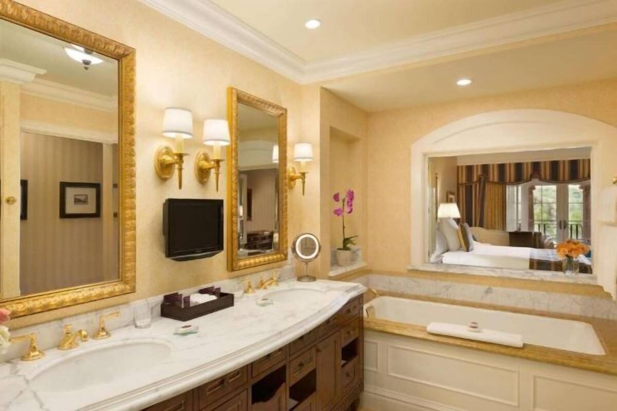 Separate tub and shower, deep soaking tub, designer toiletries