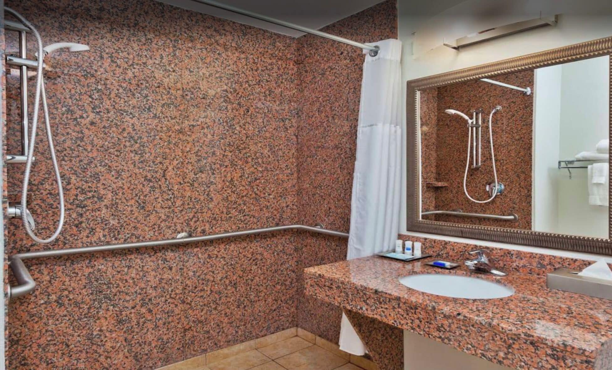 combined shower/bathtub, free toiletries, hair dryer, towels