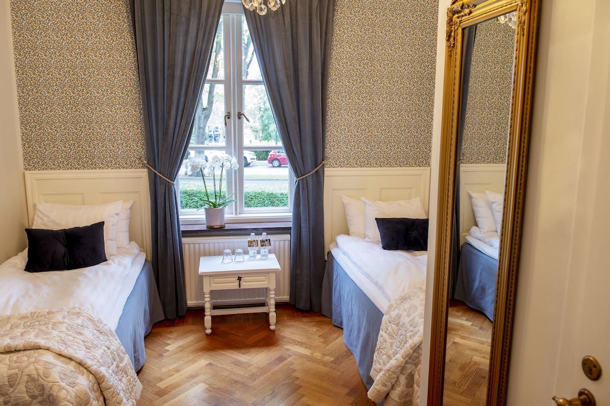 standard twin room, 2 single beds | individually decorated, iron/ironing board, free wifi, bed sheets