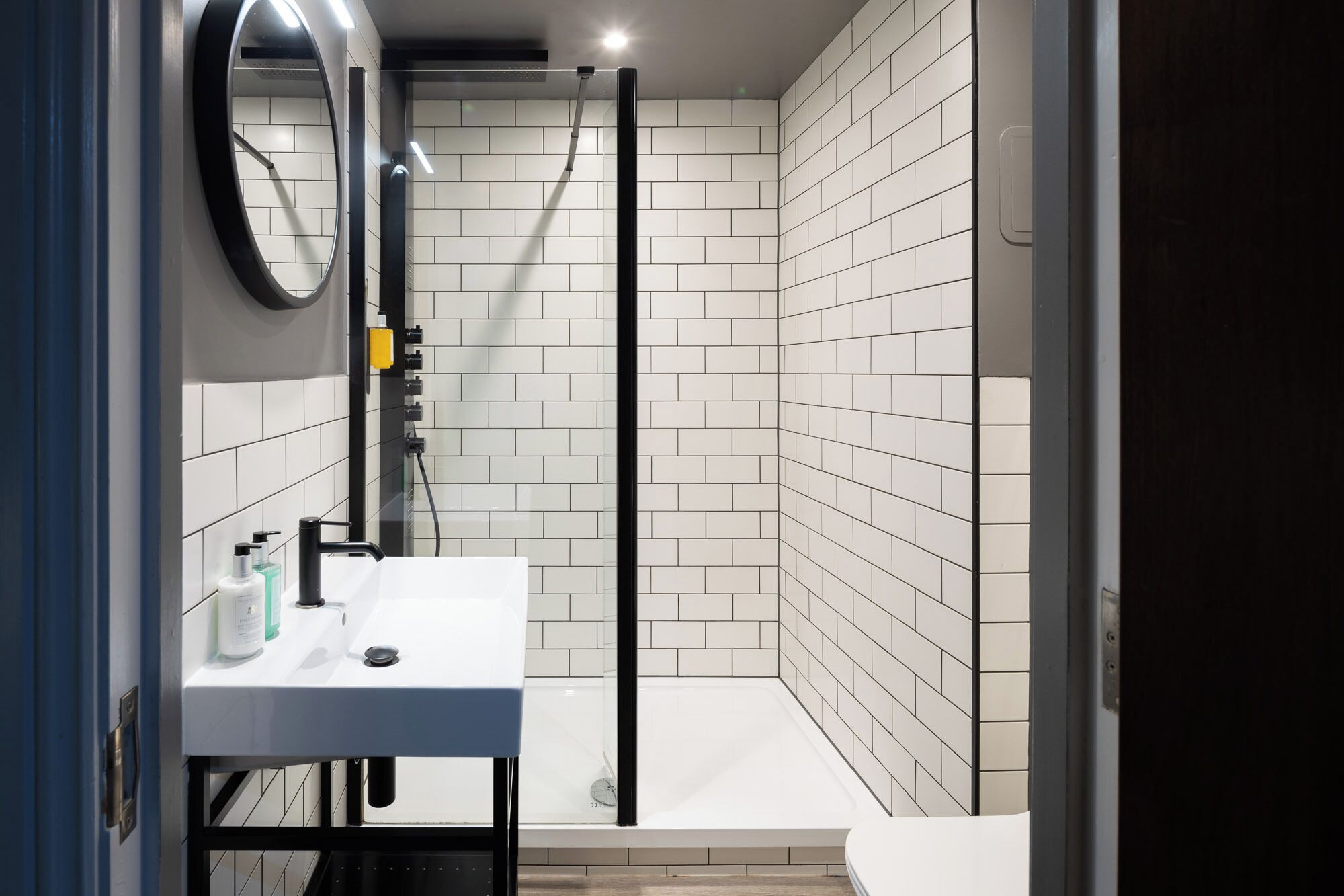 designer toiletries, hair dryer, towels