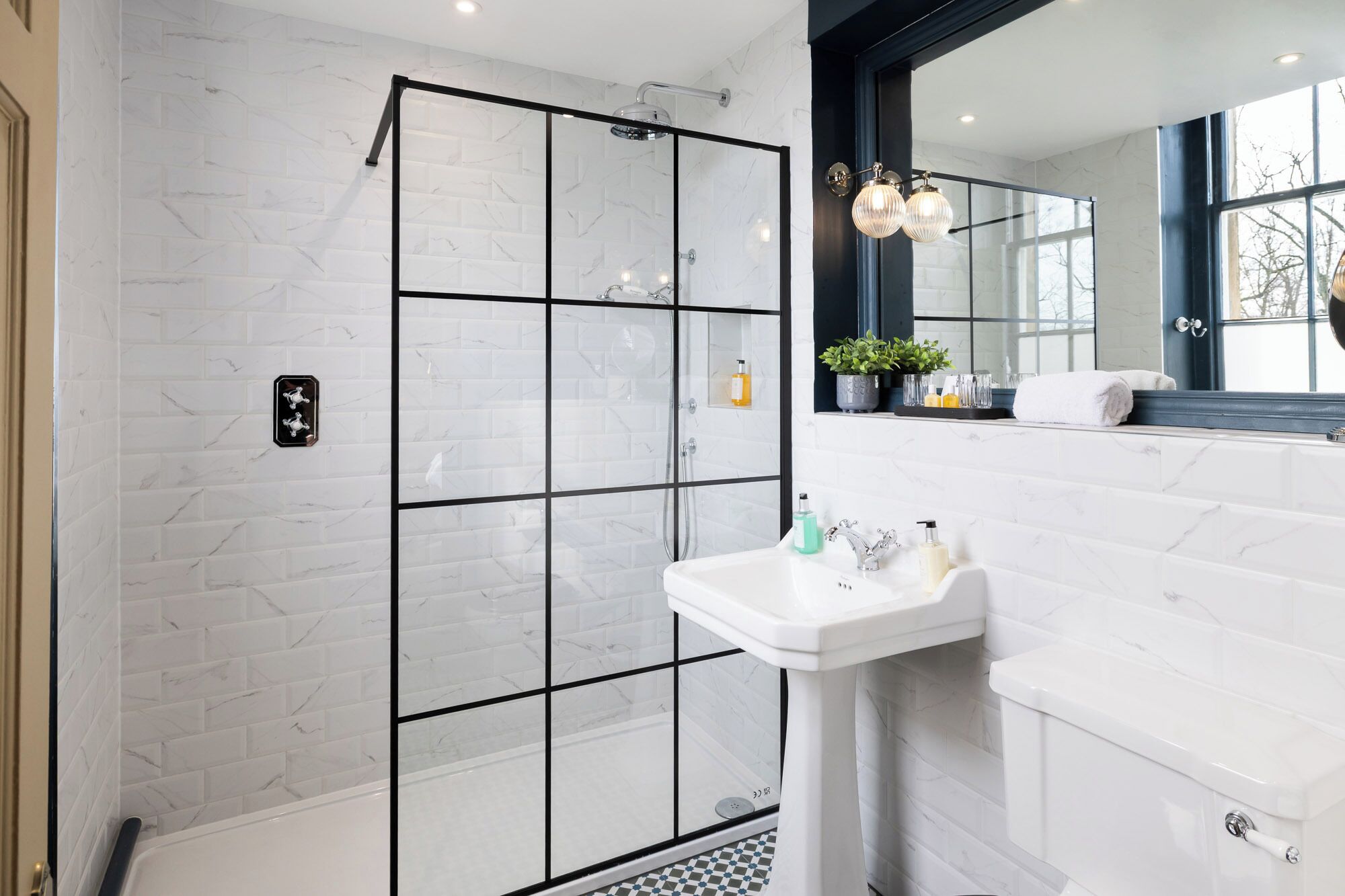 luxury collection four poster room | bathroom | designer toiletries, hair dryer, towels