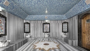 A bathroom with three sinks, a decorative star pattern on the floor, and blue mosaic tiles on the ceiling. - Dinc Hotel (Antalya)