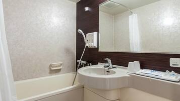 Combined shower/tub, deep soaking tub, free toiletries, hair dryer