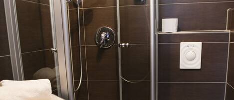 Shower, free toiletries, hair dryer, towels