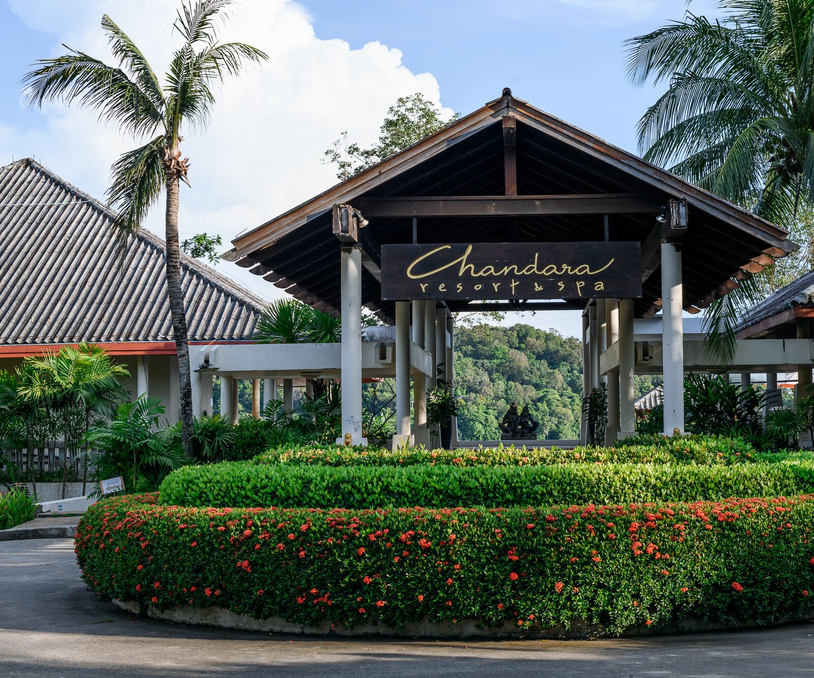 A resort entrance with a sign reading "Chandara Resort & Spa".