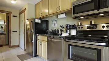 Condo, 1 Queen Bed with Sofa bed (Scandinavian Lodge and SL206) | Private kitchen | Fridge, microwave, coffee/tea maker