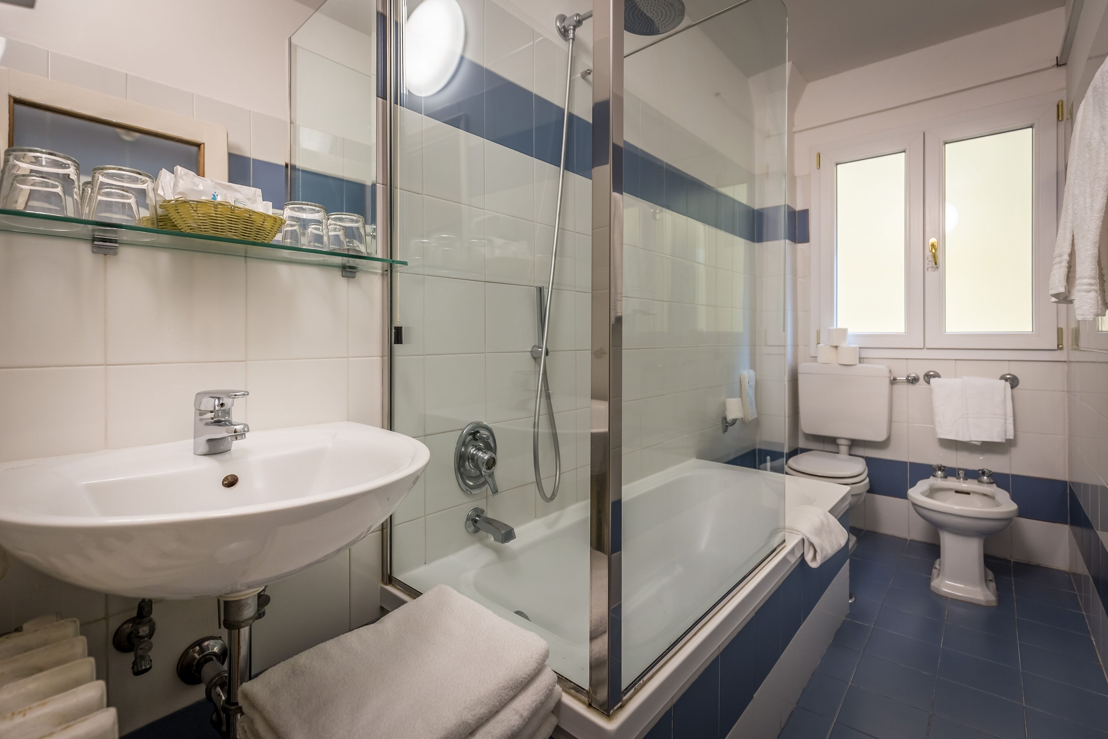 quadruple room | bathroom | hair dryer, bidet, towels, soap