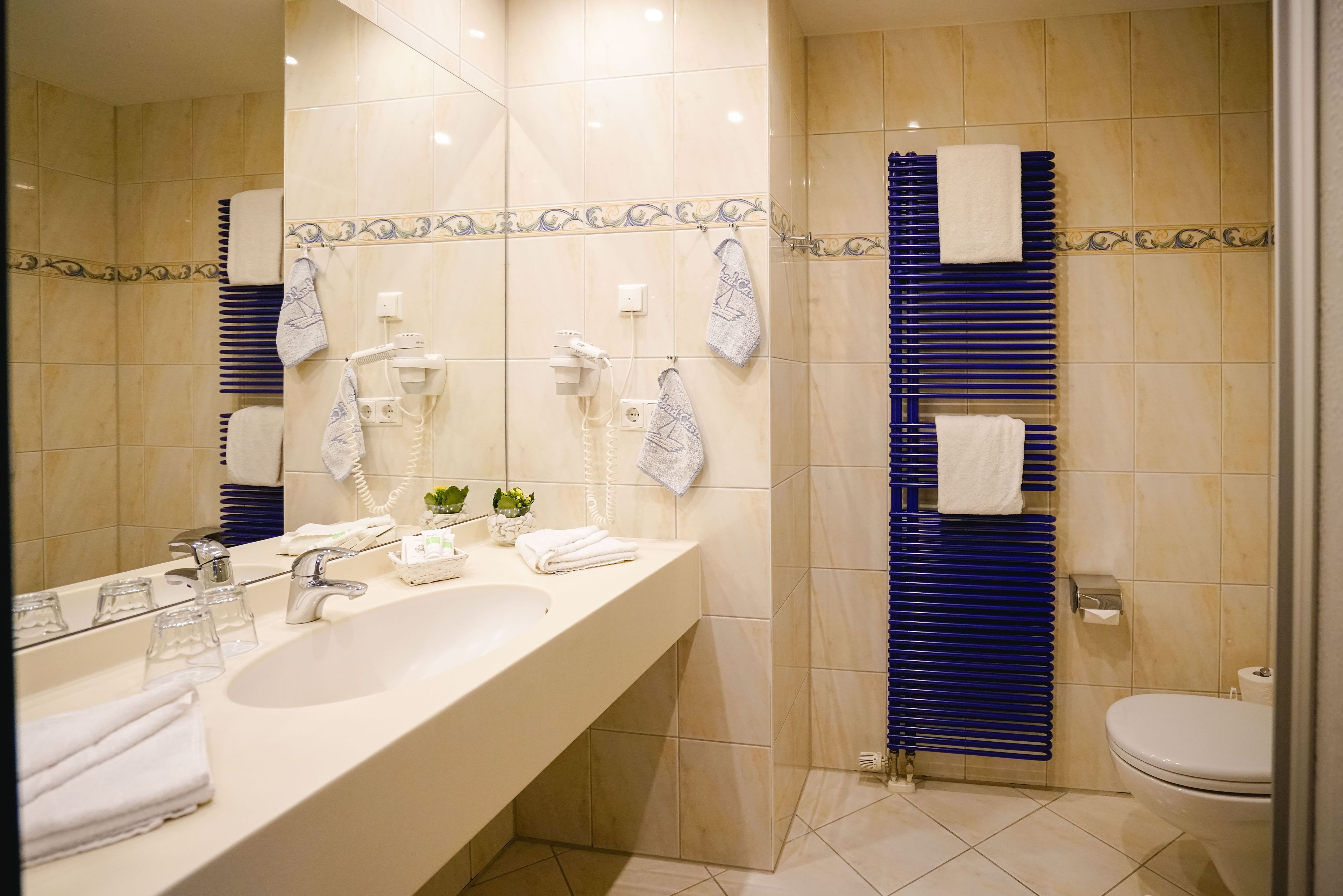 shower, free toiletries, bathrobes, slippers