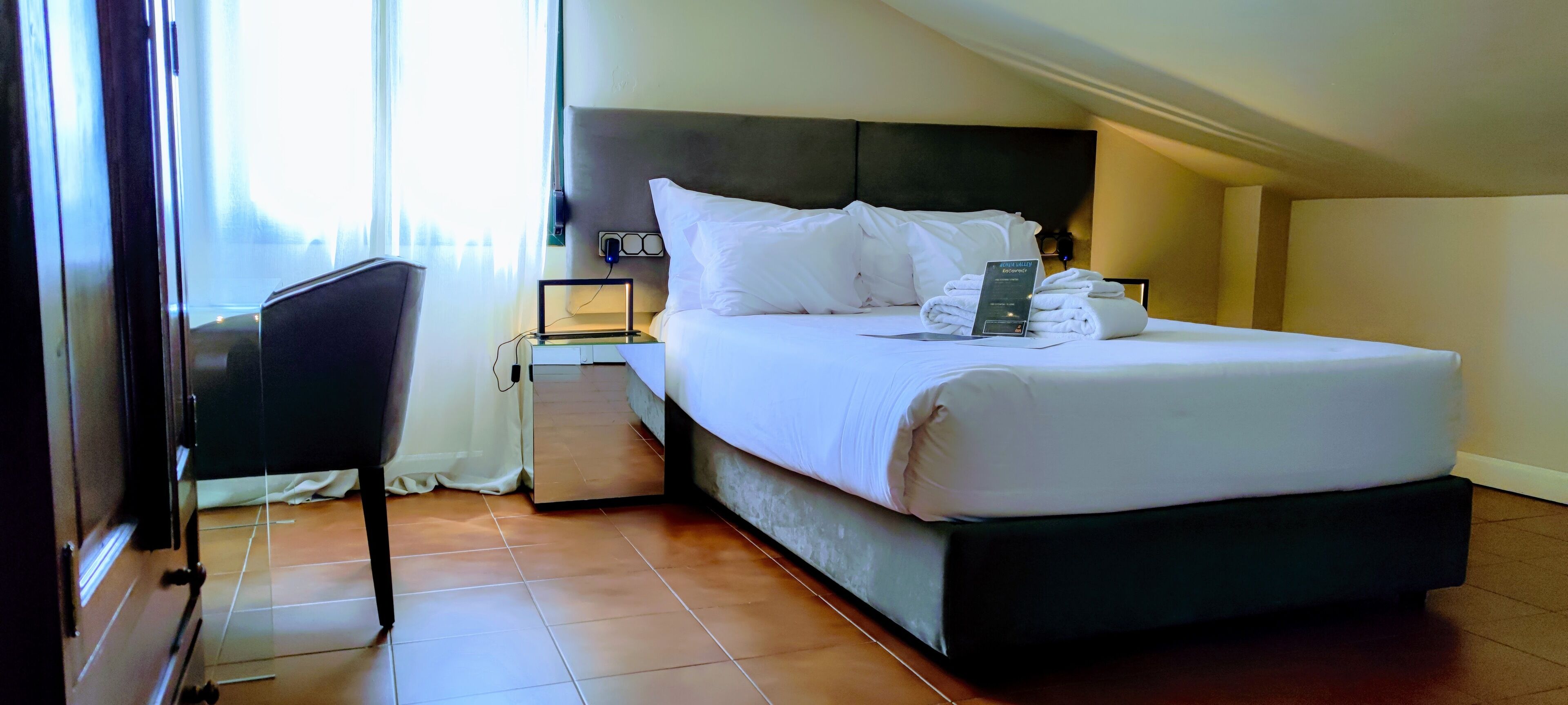deluxe single room | premium bedding, soundproofing, free cots/infant beds, rollaway beds