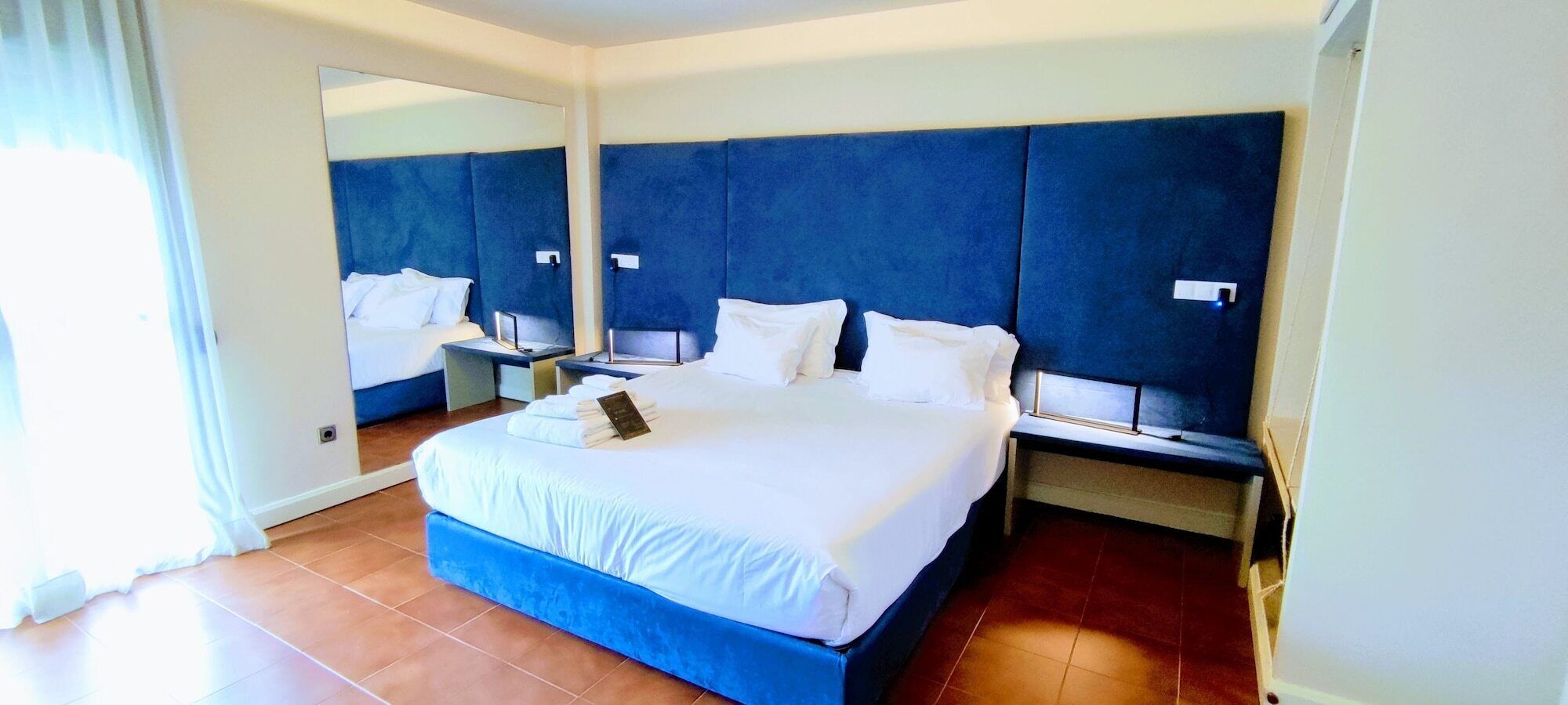 Premium bedding, soundproofing, free cribs/infant beds, rollaway beds