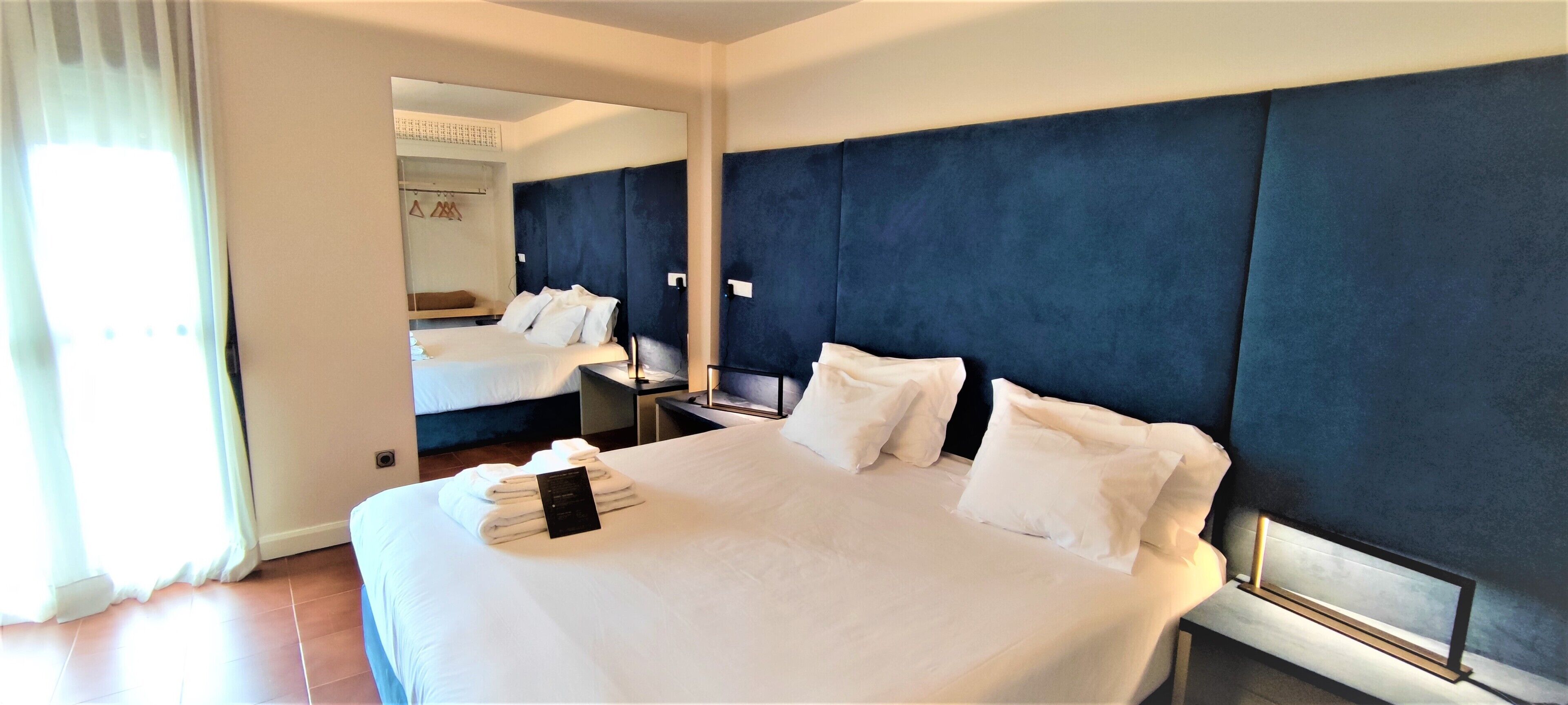 deluxe double room | premium bedding, soundproofing, free cots/infant beds, rollaway beds