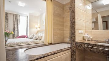 Superior Double Room | Bathroom | Designer toiletries, hair dryer, bathrobes, slippers