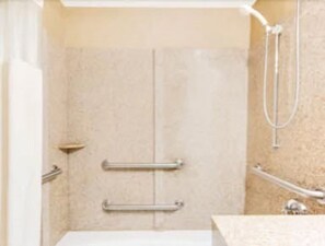 Combined shower/tub, designer toiletries, hair dryer, towels