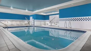 Indoor pool, open 6:00 AM to 10:00 PM, pool loungers
