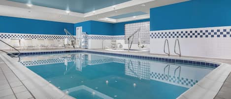 Indoor pool, open 6:00 AM to 10:00 PM, pool loungers