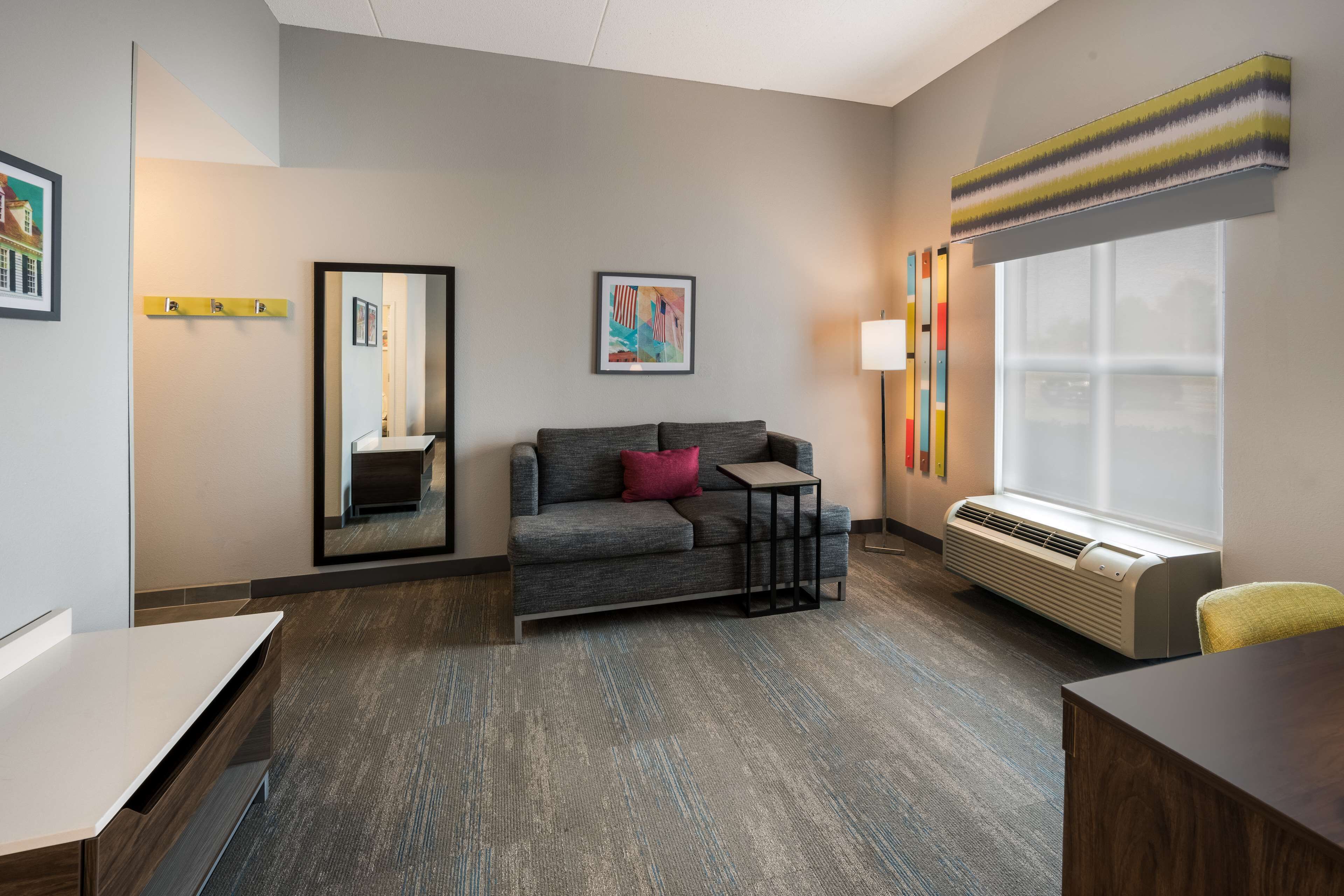 studio suite, 1 king bed, non smoking | living area | 32-inch lcd tv with cable channels, tv, dvd player