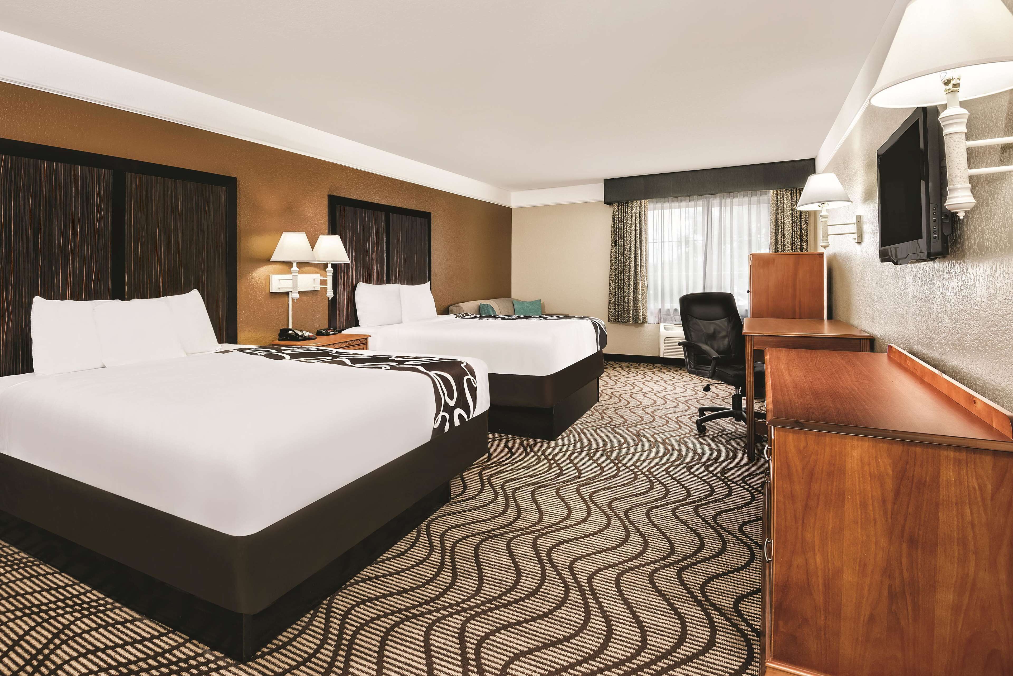 Premium bedding, pillowtop beds, desk, iron/ironing board
