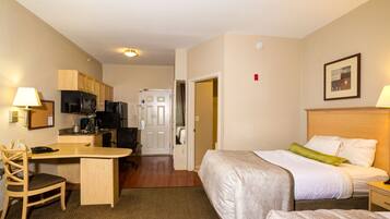 Studio Suite, 2 Double Beds | In-room safe, desk, iron/ironing board, free WiFi