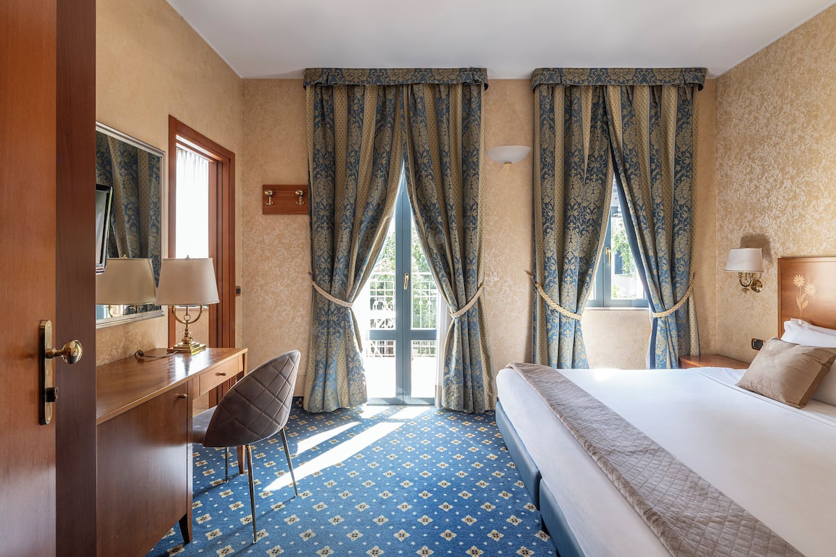 Down duvets, minibar, in-room safe, desk
