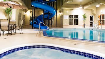 Enjoy a refreshing swim in the large pool or relax in the hot tub area.