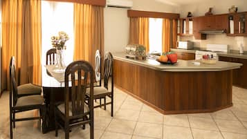 Senior Double Room | Living area | 32-inch TV with cable channels