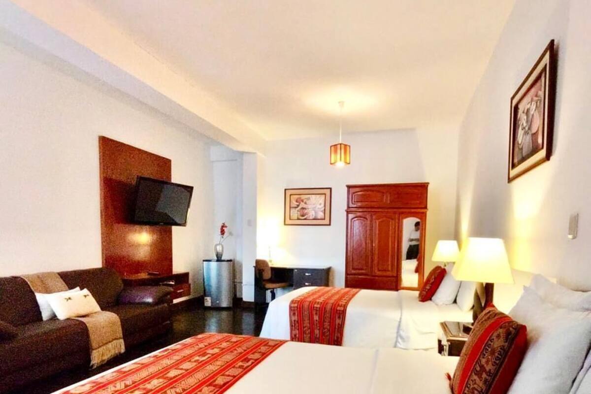 Down comforters, in-room safe, desk, WiFi (free)