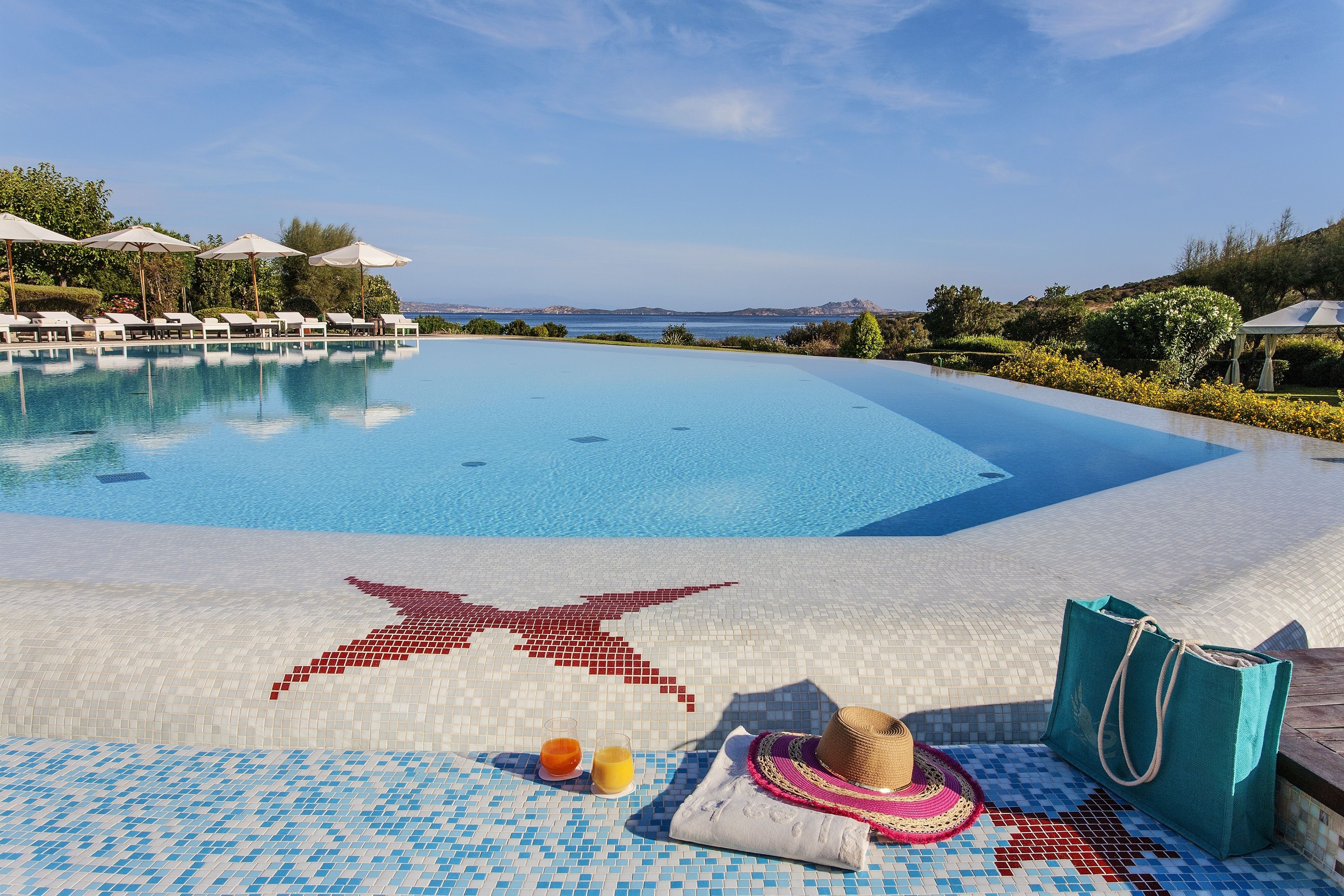 Outdoor pool, pool umbrellas, pool loungers