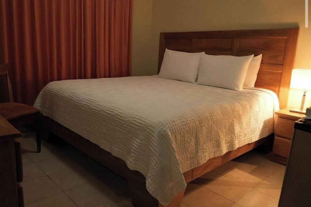 superior room, 1 king bed | minibar, in-room safe, iron/ironing board, free wifi