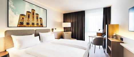 Literie de qualité supérieure, coffres-forts dans les chambres, bureau