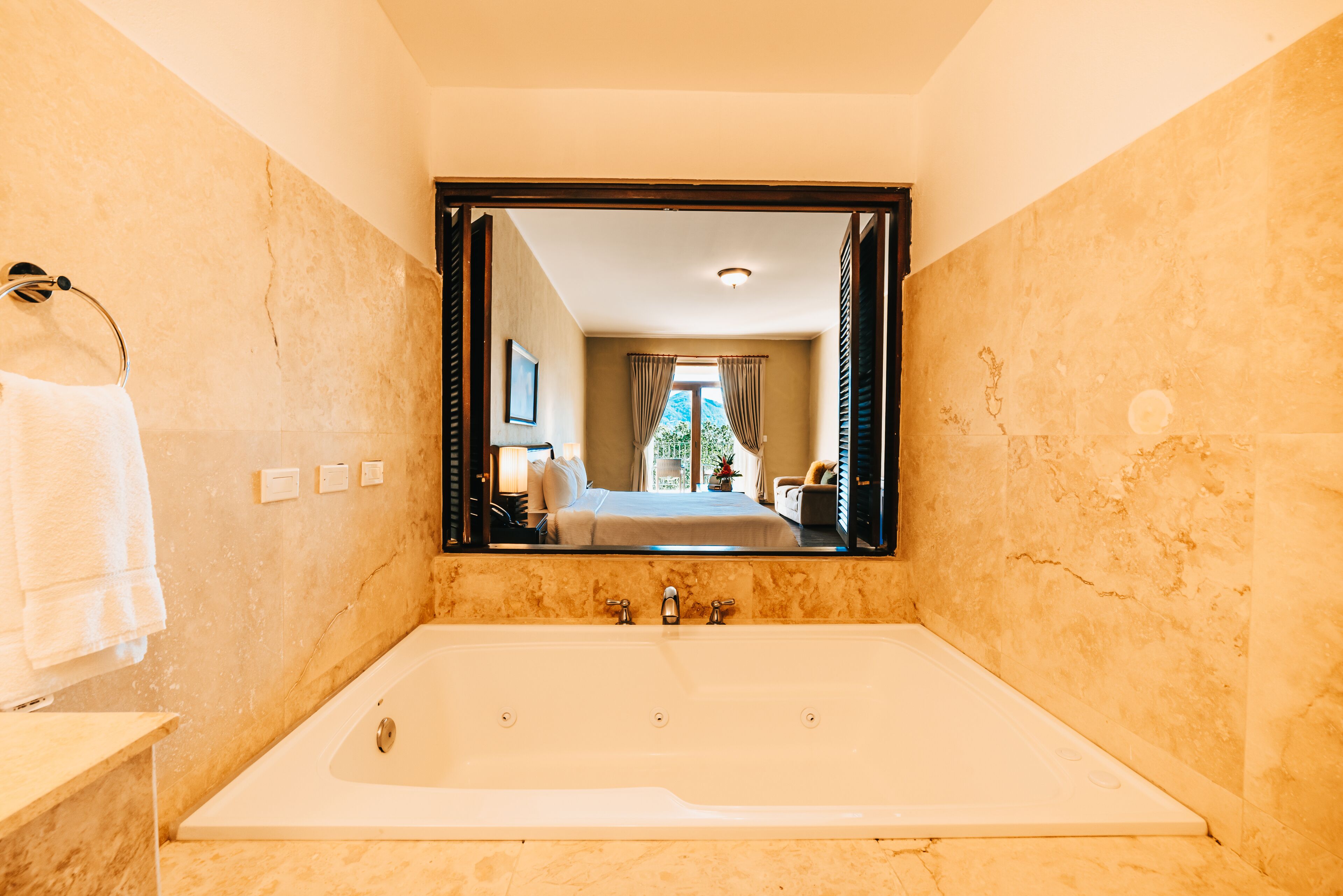 honeymoon room | bathroom | hair dryer, bathrobes, towels