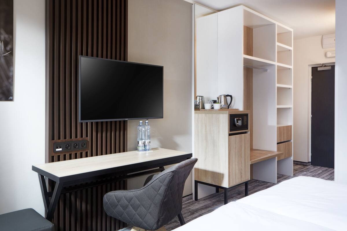 desk, blackout curtains, iron/ironing board, free wifi