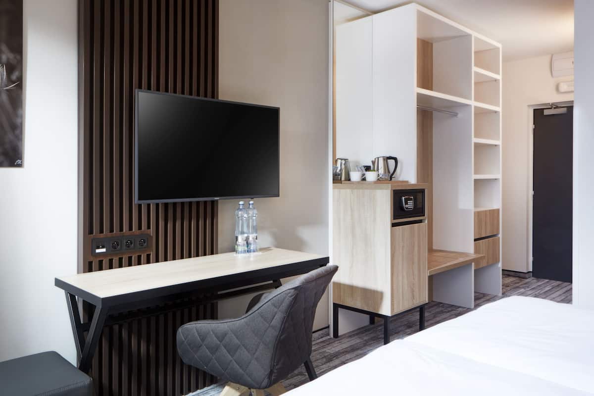 Desk, blackout drapes, iron/ironing board, free WiFi