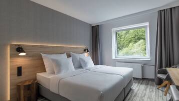 Deluxe Double Room | Desk, blackout drapes, iron/ironing board, free WiFi