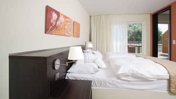 Comfort Suite | 1 bedroom, minibar, in-room safe, desk